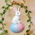 Close-up detail of cute white rabbit on polka dot Easter egg with gold bow decoration ornament - Style 1