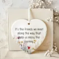Heart-shaped ceramic hanging ornament with floral design and friendship quote for home decor. - 8cm / 2