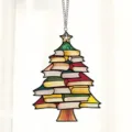 Detailed close-up view of the stacked books Christmas tree acrylic hanging ornament. - Style 4