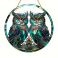 Close-up detail view of the stained glass style blue owls round hanging acrylic ornament. - Style 11
