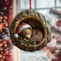 Detailed close-up of the cute sleeping bear in tree hollow Christmas acrylic hanging ornament. - Tree Hole Little Bear