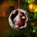 Christmas tree ornament featuring a cute red cardinal bird inside a tree hole hanging pendant. - Tree Hole Cardinal Bird