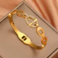 Gold-plated anchor chain bangle with sparkling zircon pavé, elegant fashion jewelry accessory. - Oval / Gold