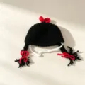 Handmade crochet black winter hat with braided pigtails and cute red bows, soft warm knit beanie. - Knitted Black Ponytail Style
