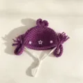 Hand-knitted purple crochet beanie hat featuring braided pigtails and shiny star decor. - Knitted Purple Pearl Twin Tails Style