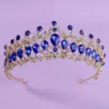Elegante goldene Brautiara mit funkelnden blauen Kristall-Strasssteinen für Hochzeits-Haarschmuck - Blau Strass Krone (TS-J3104GBLUE) / Gold
