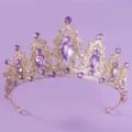 Elegant gold bridal tiara with sparkling purple gemstones for wedding party performance. - Purple Rhinestone Crown (TS-J2720GPURPLR) / Gold