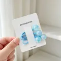 Cute blue hair ties with shiny beads on card for girls kids accessories daily wear cute style. - Cracked Bead Style / Blue