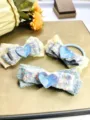 Closeup of sweet fuzzy bow hair clips set with blue crystal heart, cute hair accessories. - Blue Tweed Plush Set (Set 6)