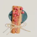 Decorative dried cinnamon stick bouquet with pink berries for gifts and home decor. - Style 10