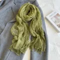 Olive green slub nylon scarf detailed view, lightweight breathable neck accessory for autumn. - Green