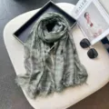 Detailed shot of retro green plaid cotton linen scarf with frayed fringe, elegant accessory. - 200x75cm / Light Green