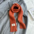Cozy orange ribbed knitted narrow scarf for women, stylish winter warm long scarf accessory. - 155x7cm / Orange Red