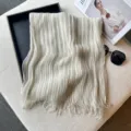 Lightweight sheer striped scarf with fringe detail, elegant summer shawl accessory for women. - Beige