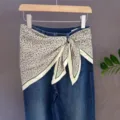 Leopard print silk scarf tied on blue denim jeans, versatile decorative fashion accessory. - 40#