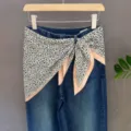Blue denim jeans paired with stylish black and white leopard print decorative scarf waist wrap. - 38#