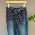 Stylish blue denim jeans paired with a chic navy and white striped silk scarf as a waist belt. - Polka Dot (#3)