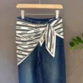 Stylish blue denim jeans paired with a chic black and white printed fashion scarf accessory. - 37#