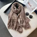 Detailed view of a retro plaid cotton linen scarf, featuring fringe edges in casual setup. - 200x75cm / Coffee