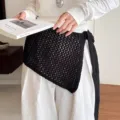 Detail view of Korean style hollow knit square scarf waist belt layering fashion accessory. - Black