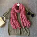 Detailed view of women's red and white striped crinkled long scarf, showcasing soft texture. - Wine Red