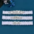 Detailansicht von 3 Stk. weißer Spitzen Strumpfband Set mit Strass für Hochzeit. - STS337 + ST33 + ST20 3-Teiliges Set