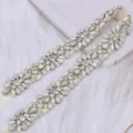 Detailed view of the handmade rhinestone pearl bridal sash belt for wedding dresses. - Sequins Without Ribbon