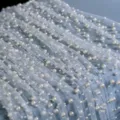 Tessuto in tulle a rete di perle bianche per velo da sposa fai da te e lavori di cucito. - Avorio