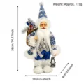 Muñeco de peluche de Papá Noel de pie con traje de punto azul, saco de regalos y linterna. - Papá Noel Azul