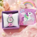 Close-up detail of the cute children quartz watch with pink strap and unicorn gift box. - Epoxy Pink Unicorn With Gift Box