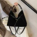 Chic black suede shoulder backpack, versatile commuter tote bag with stylish metal hook design. - Black