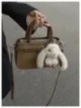 Chic brown PU leather shoulder handbag with cute fluffy bunny charm for daily commute. - With Pendant / Brown