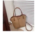 Casual woven tote shoulder bag for women, stylish straw bucket handbag with top handle. - Tan