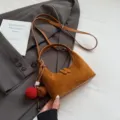 Brown suede shoulder bag for women, vintage crescent hobo handbag with cute pom-pom tassel charm. - With Pendant / Brown