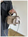 Stylish khaki handbag with cute bunny charm, perfect for daily commute and autumn chic. - With Pendant / Khaki