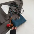 Suede dumpling bag, dark blue shoulder handbag, retro autumn winter stylish crossbody bag variant. - With Pendant / Blue