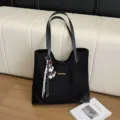 Stylish black suede tote bag with cute dog charm, large capacity casual shoulder handbag. - With Pendant / Black