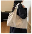 Large capacity oxford cloth shoulder bag, casual underarm tote bag for daily commuting style. - Off White