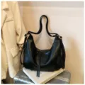 Classic black PU leather hobo shoulder backpack, large capacity minimalist casual commuting bag. - No Pendant / Black