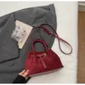 Burgundy suede crossbody bag for women, retro drawstring handbag with metal buckle and strap. - No Pendant / Burgundy