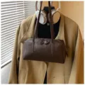 Retro brown PU leather bowling bag, stylish underarm shoulder pillow bag for women's daily commute. - No Pendant / Coffee