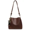 Stylish brown PU leather bucket shoulder bag with cute rabbit charm for autumn winter. - With Pendant / Brown