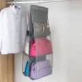 Organisateur de sac à main suspendu en tissu gris avec poches en filet pour votre placard. - L / Gris