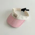 Kids pink and white sun visor hat empty top children summer beach cap with bow detail - 48-52cm / Dark Pink Brim