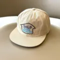 Detalle de una gorra de beisbol beige para ninos con eslogan bordado y visera plana. - 3-8 Años (Ref Circunferencia de Cabeza 50-54cm) / Albaricoque