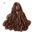 Close-up detail of shimmering brown chiffon long scarf showing sparkly texture and fine edge finish. - 9#