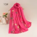 Pink embroidered scarf detail showing floral patterns and lightweight sheer fabric structure. - 10#
