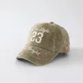 Vintage gewaschene bestickte Baseballkappe Detailansicht mit stilvoller Nummer und Stickerei chic. - 50-52cm / Grün