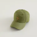 Detailed close-up of olive green kids baseball cap with cute yellow starfish embroidery. - Grass Green