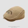 Kinder khaki Baumwolle Schiebermütze mit schwarzer Stickerei und stylischem Kontrastpaspel. - 50cm Verstellbar Passend Für 1-3 Jahre / 1930 Buchstabe - Khaki